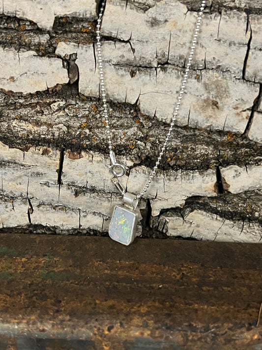 Gleaming Black Opal Pendant (Bella's Heart)