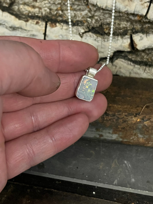 Gleaming Black Opal Pendant (Bella's Heart)